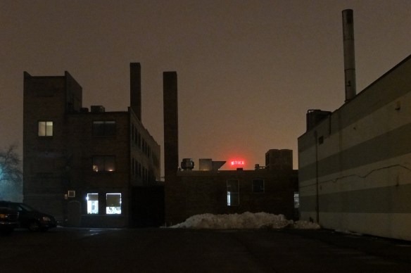 alley opens into parking lot