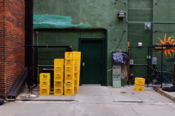 Stacks of yellow crates