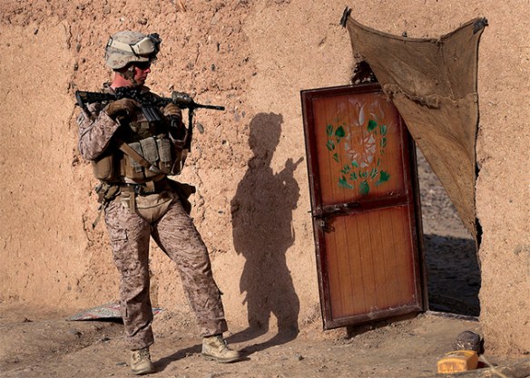 Cpl. Zachery K. Arrowood with 1st Battalion, 9th Marine Regiment, provides security during a patrol in Helmand province, Afghanistan, Oct. 12, 2013. The patrol was conducted to disrupt enemy activity in the area / Photo by Lance Cpl. Zachery B. Martin