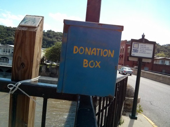 Elkader, bridge donation box