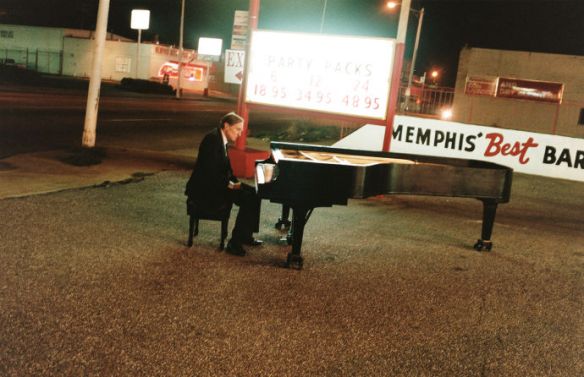 Eggleston at a piano (photo by Juergen Teller)