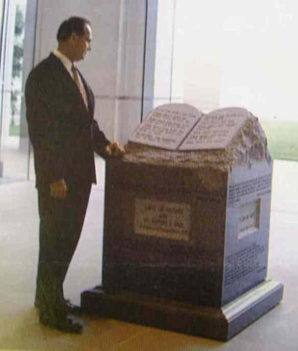Jusge Roy Moore with two-and-a-half tons of Commandments
