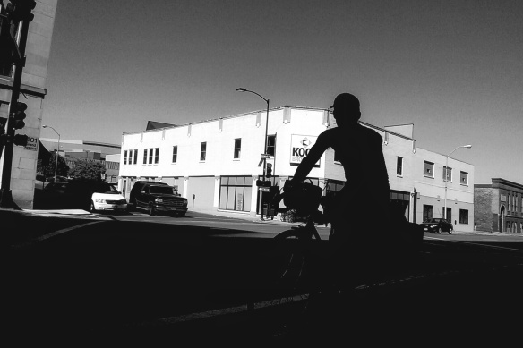 cyclist in shadow