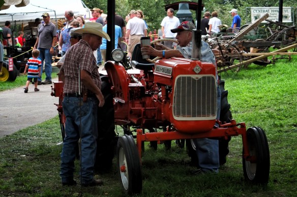 Bromance -- bonding over an Allis-Chalmers tractor.
